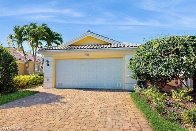 view of front of house with a garage