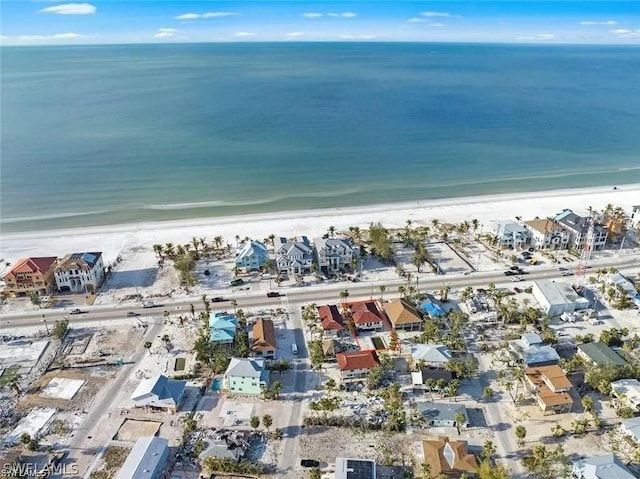 bird's eye view with a view of the beach and a water view