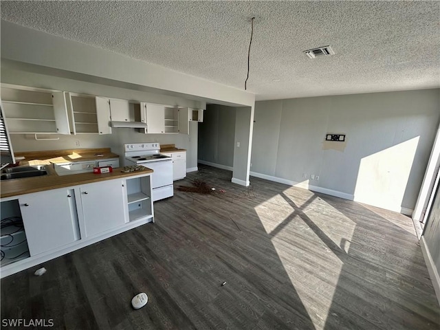 kitchen featuring butcher block counters, dark wood-type flooring, a textured ceiling, white range with electric stovetop, and white cabinetry