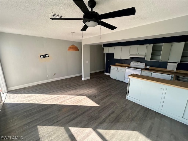 kitchen featuring dark wood-type flooring, white electric stove, hanging light fixtures, ceiling fan, and a textured ceiling