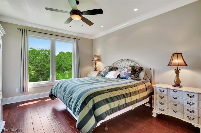 bedroom featuring ornamental molding, ceiling fan, and dark wood-type flooring