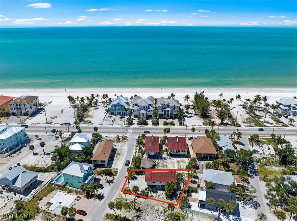 aerial view with a view of the beach and a water view