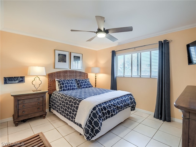 tiled bedroom with ceiling fan and crown molding