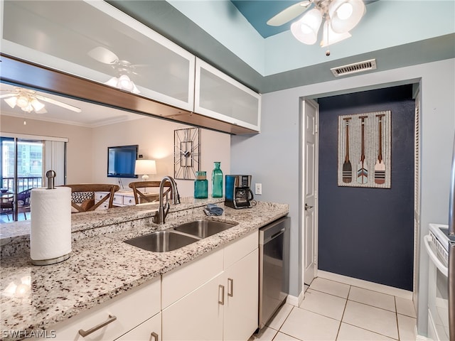 kitchen featuring white electric range, white cabinetry, stainless steel dishwasher, sink, and ceiling fan