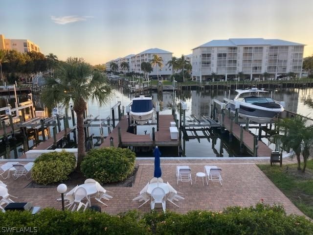 dock area featuring a water view