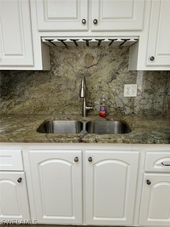 kitchen featuring white cabinetry