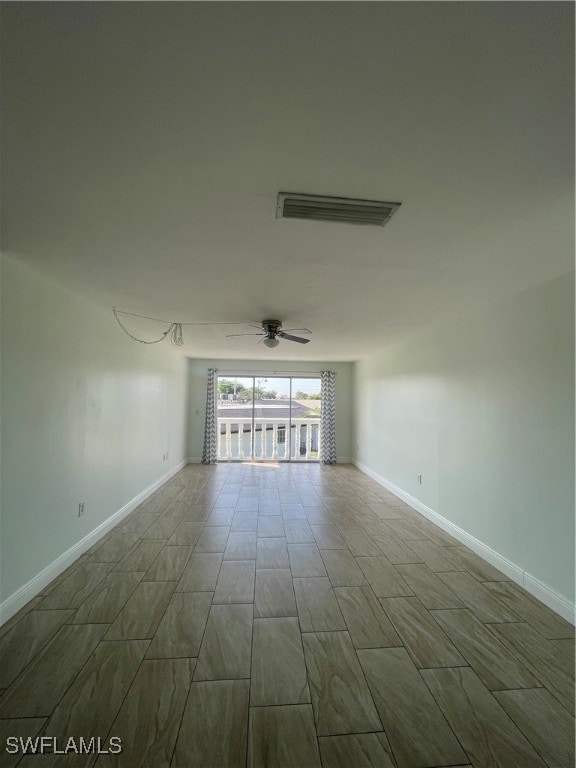 unfurnished room featuring ceiling fan