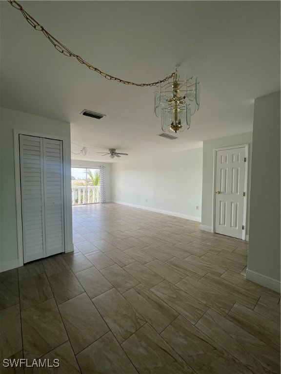 spare room with ceiling fan