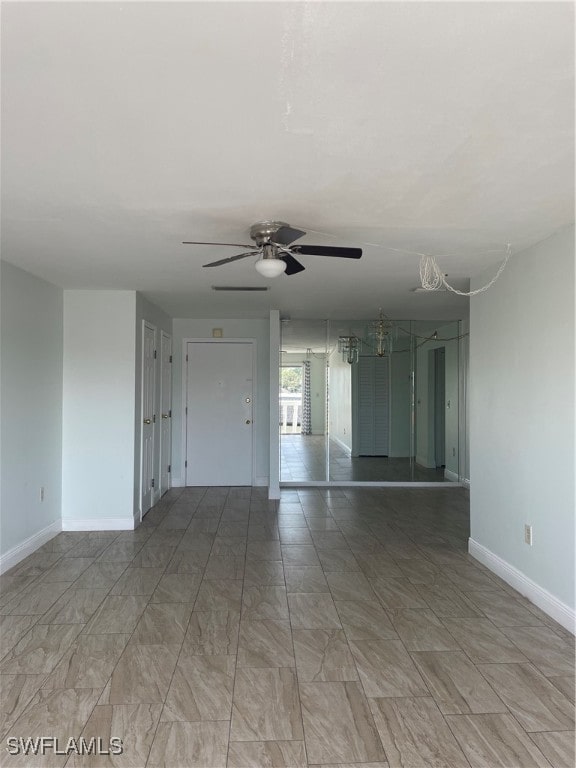 empty room with ceiling fan