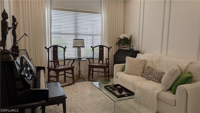 living room with light colored carpet