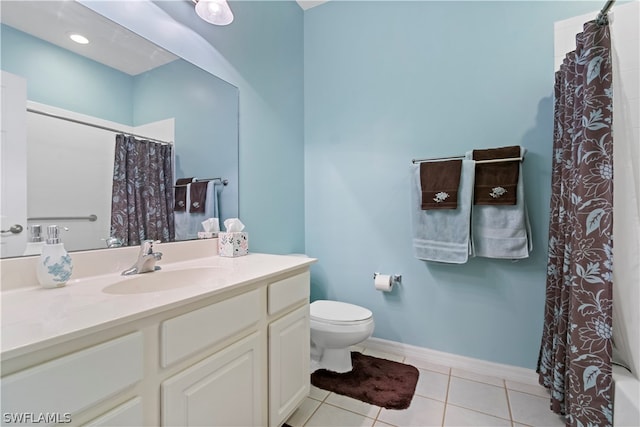 full bathroom with shower / tub combo, toilet, tile floors, and vanity