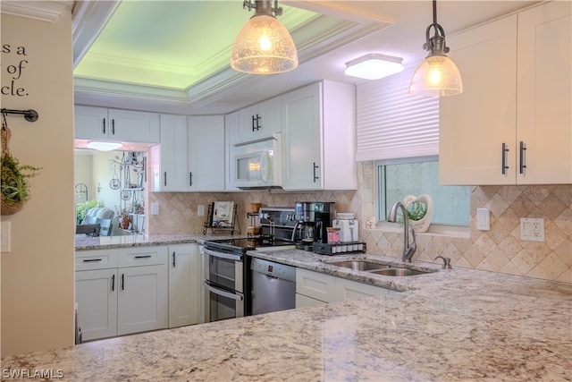 kitchen featuring white cabinetry, backsplash, sink, a raised ceiling, and dishwasher