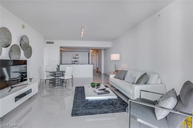 living room with light tile floors