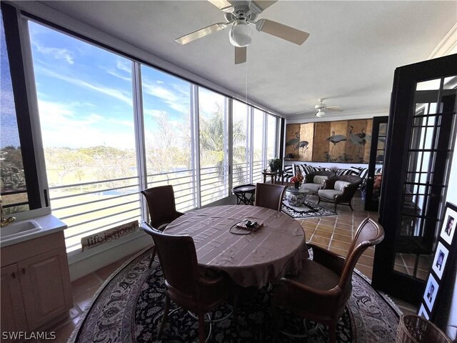 dining space with ceiling fan