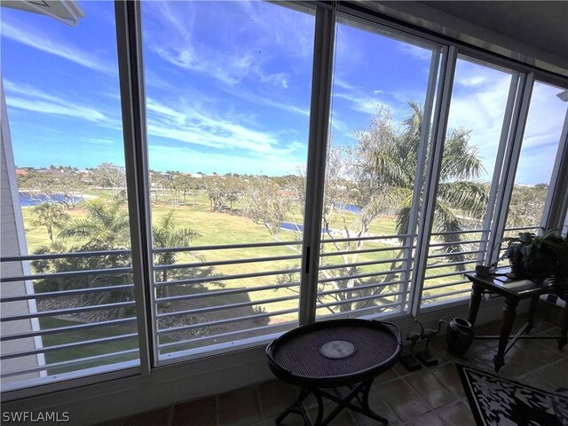 sunroom featuring a healthy amount of sunlight