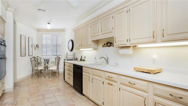 kitchen featuring sink, cream cabinets, ornamental molding, and black dishwasher