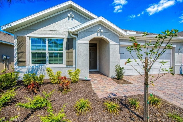 entrance to property featuring a garage