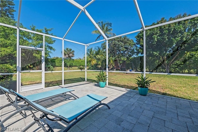 view of patio / terrace with a lanai