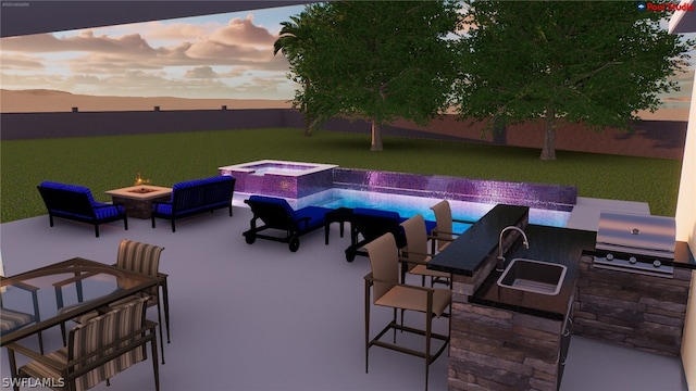 patio terrace at dusk with a fire pit, area for grilling, and sink