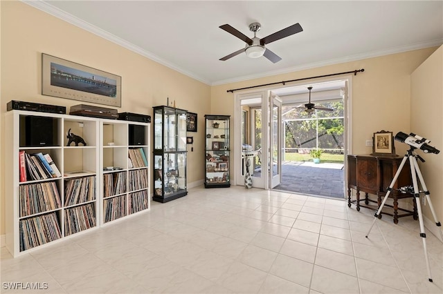 sitting room featuring light tile patterned floors, ceiling fan, and crown molding