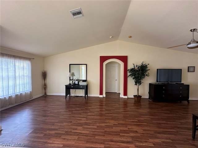 living room with lofted ceiling, ceiling fan, and dark wood-type flooring