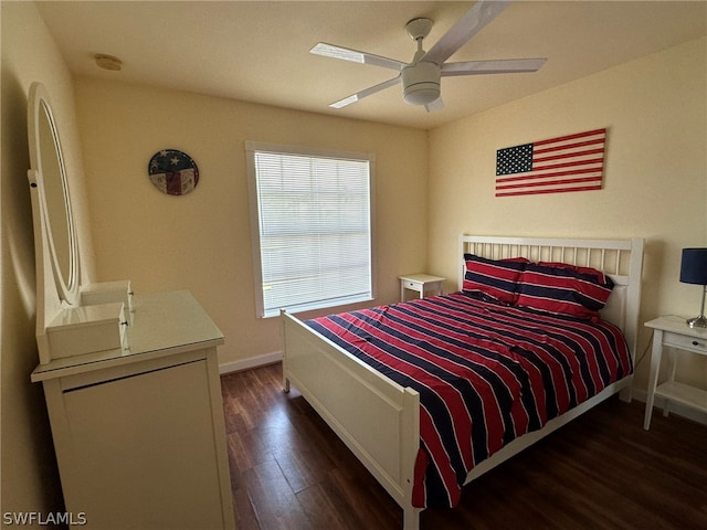 bedroom featuring dark hardwood / wood-style floors and ceiling fan