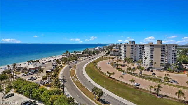 aerial view featuring a water view and a beach view