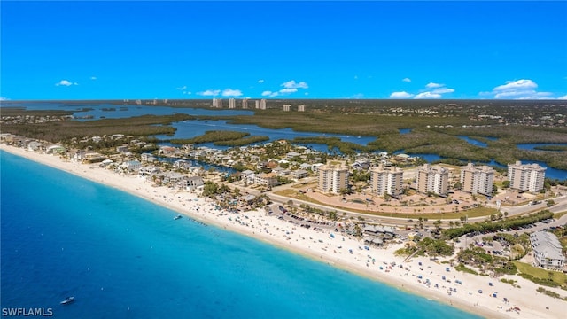 bird's eye view featuring a beach view and a water view