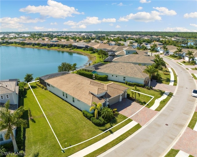 aerial view featuring a residential view and a water view