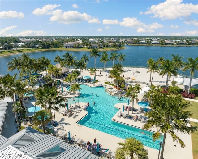 birds eye view of property featuring a water view