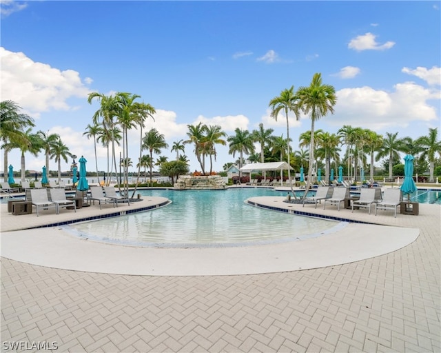 community pool with a patio