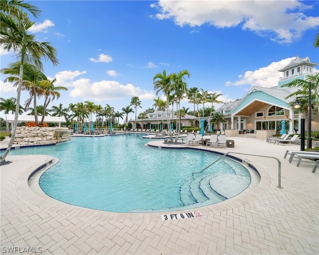 community pool featuring a patio area