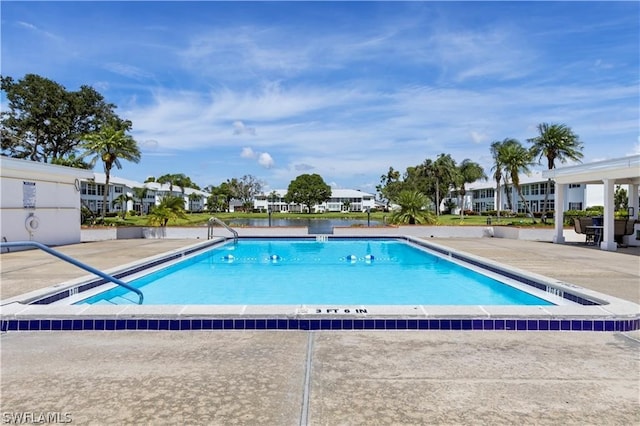 view of pool with a patio area