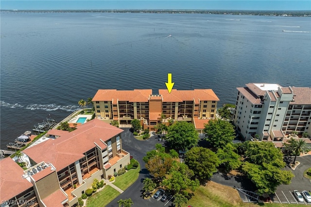 drone / aerial view with a water view