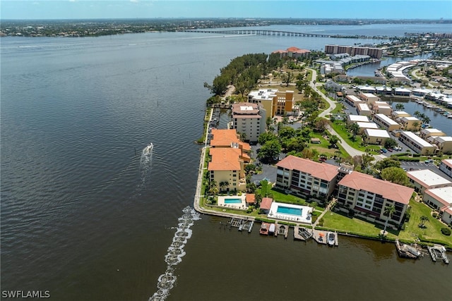 birds eye view of property featuring a water view