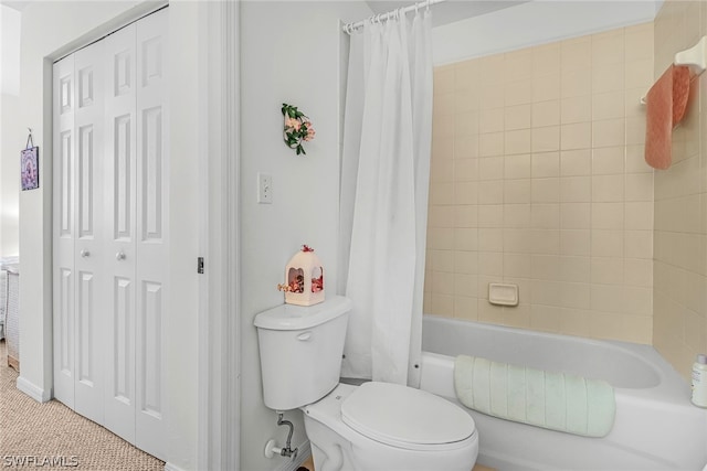 bathroom featuring shower / bathtub combination with curtain, toilet, and tile floors