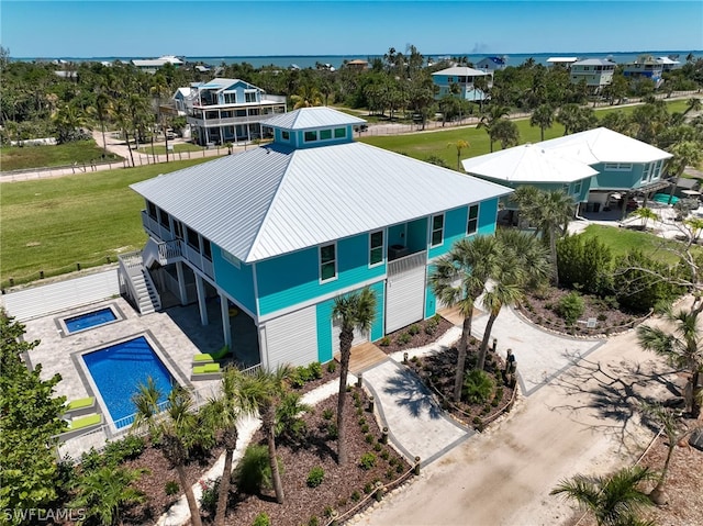 drone / aerial view featuring a water view