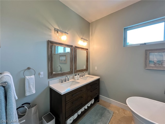 bathroom featuring tile floors and dual bowl vanity