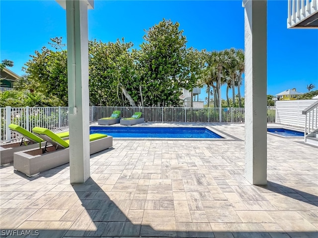 view of pool with a patio area