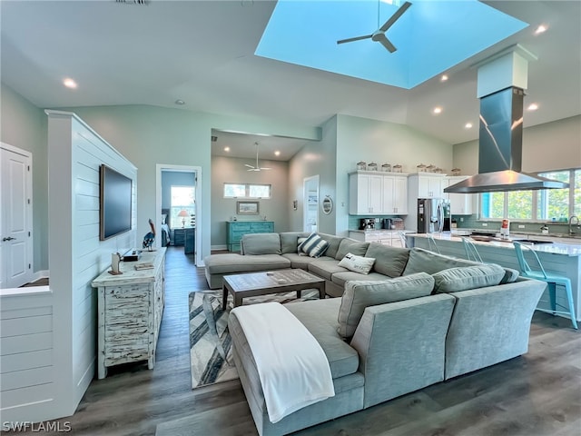 living room featuring high vaulted ceiling, ceiling fan, and dark hardwood / wood-style flooring