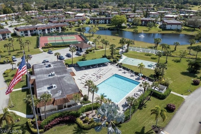 bird's eye view with a water view