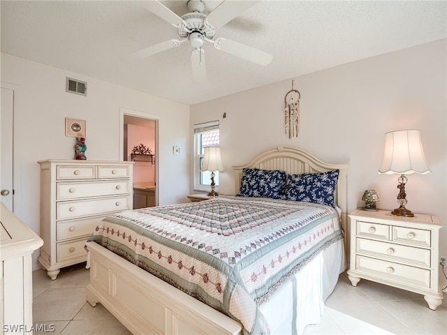 tiled bedroom with ceiling fan