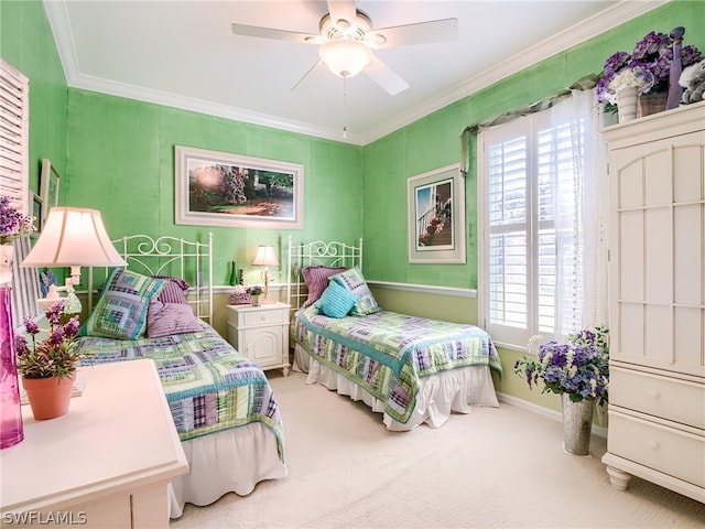 bedroom featuring light carpet, ceiling fan, and crown molding