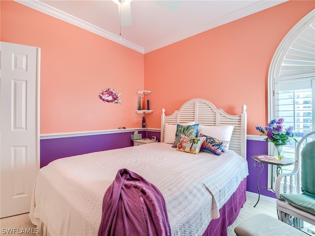 bedroom with light colored carpet, ceiling fan, and ornamental molding