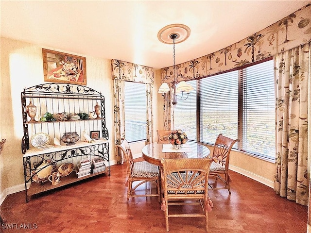 dining space featuring hardwood / wood-style flooring