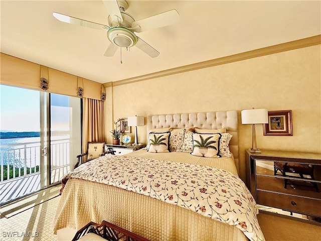 carpeted bedroom featuring access to exterior and ceiling fan