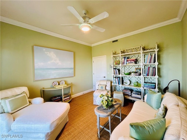 interior space with ceiling fan and ornamental molding