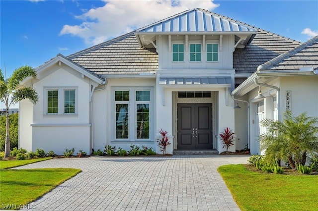 view of front of home with a front lawn