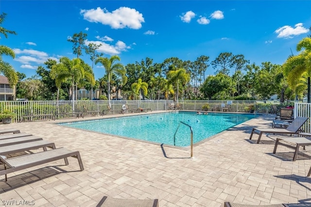 view of pool featuring a patio area