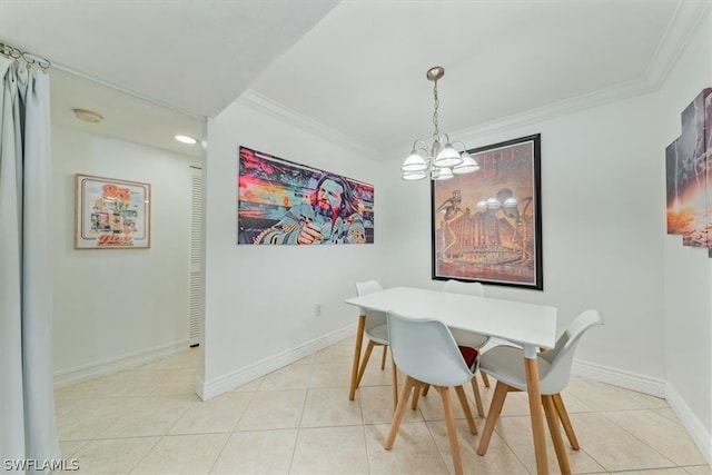 tiled dining space featuring crown molding and an inviting chandelier